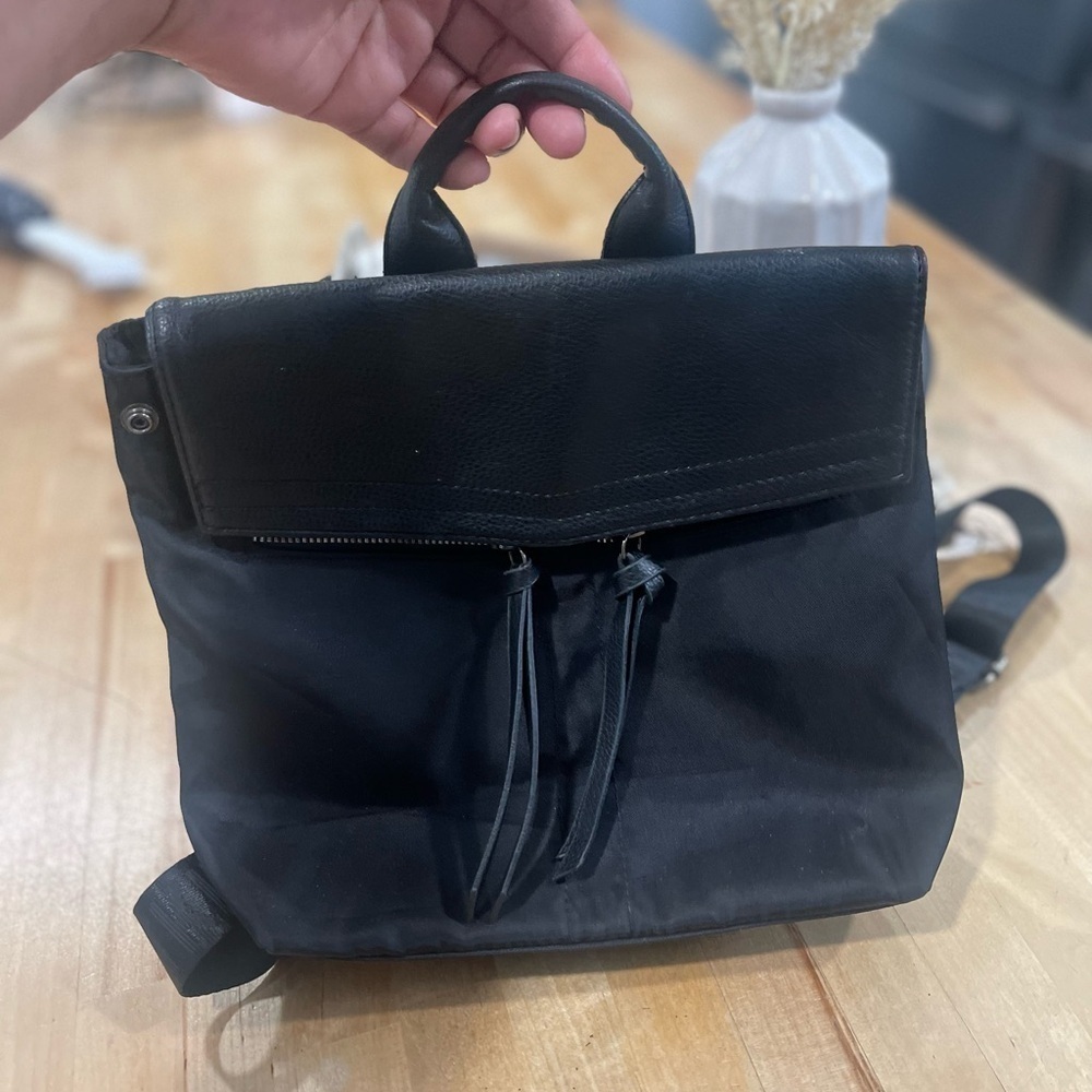 Botkier York Mini Trigger Backpack Nylon Faux Leather Black Logo Straps